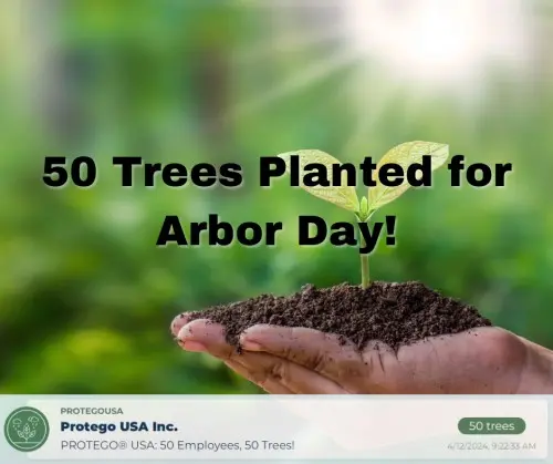 A hand holds a small seedling with soil against a blurred green background, overlaid with the text “50 Trees Planted for Arbor Day!” and a Protego USA post banner.