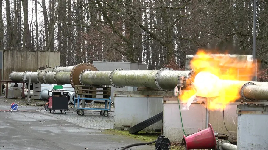 Outdoor testing of explosion safety technology, showcasing innovation in protecting industrial pipelines.